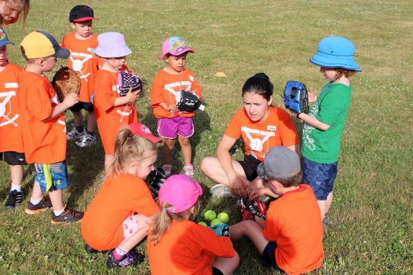 Children receiving instruction at Summer Camp