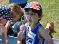 Child blowing bubbles at Summer Camp