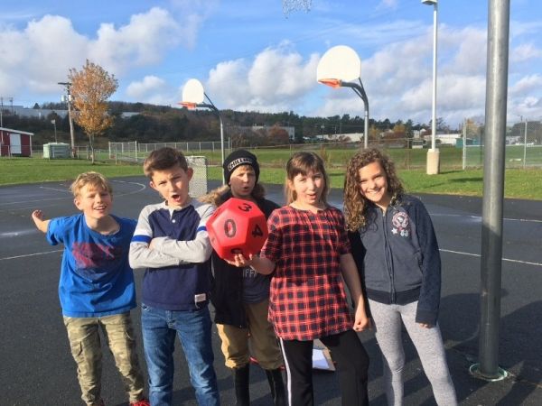 Children outside playing Math Dodgeball Children outside playing Math Dodgeball