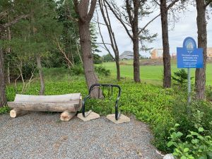 Close up view of log bench and bike stand - Indian Point Rest Stop Close up view of log bench and bike stand - Indian Point Rest Stop